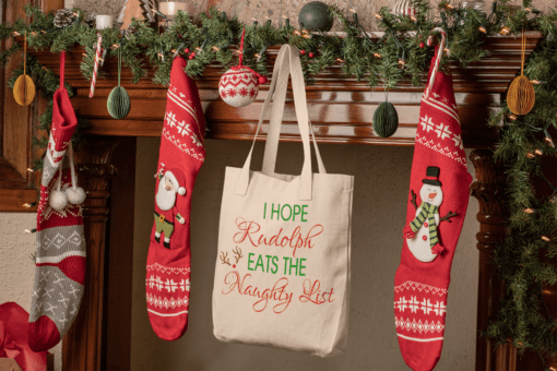 rudolph eats the naughty list canvas tote